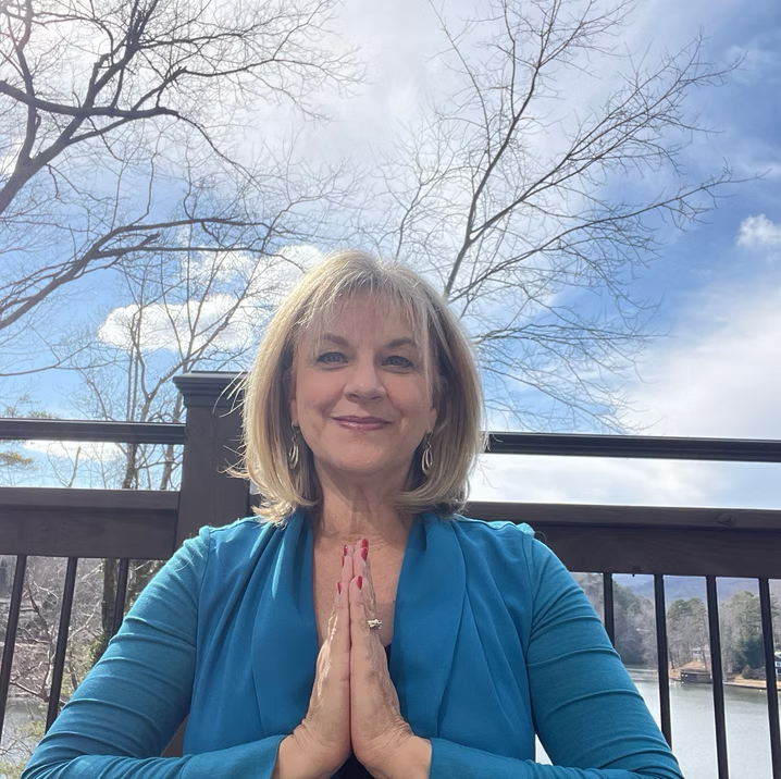 Beth Spring seated in a quiet moment of prayer
